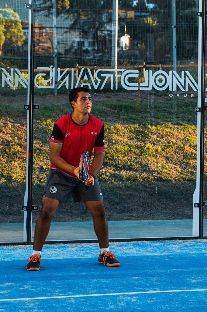 Man Playing Tennis on a Championship